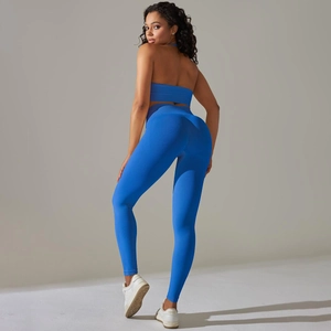 Close-up of ribbed seamless knit texture on royal blue yoga set with contoured shaping