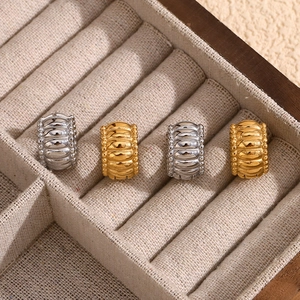 Vintage 18K gold and silver plated twisted rope hoop earrings in jewelry box display