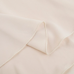 Macro shot showing high-quality chiffon fabric texture and neat overlock edge finishing