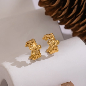 Eleganti orecchini a clip a fiore dorati in acciaio inossidabile con design floreale