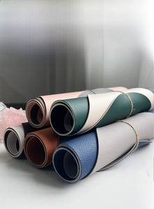 Rollable PU leather placemats showing soft texture and high flexibility in various colors