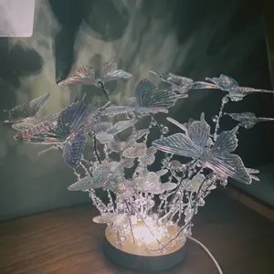 DIY handmade crystal butterfly night light with iridescent wings and warm wooden base