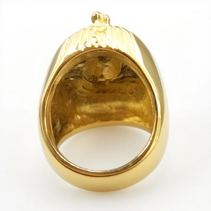 Polished gold Egyptian Sphinx pharaoh ring with detailed helmet design and textured inner band