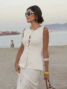 Elegant white sleeveless knit vest and matching skirt set for women with gold buttons