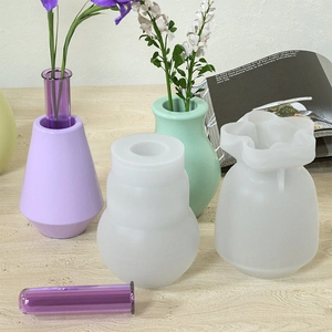 Scalloped edge candle holder and vase silicone mold kit with purple and green resin finished crafts