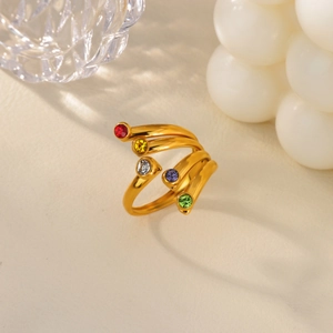 Minimalist gold ring with rainbow zircon gemstones at a high-quality 45-degree angle view