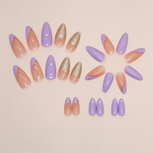 Faux ongles amande dégradé lavande et nude pailleté avec design de french manucure
