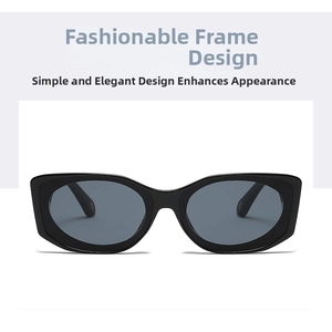 Detail of vintage square black sunglasses with thick frames and dark grey lenses