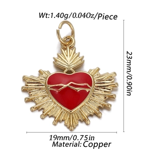 Detail of red sacred heart charm in gold finish with technical dimensions and copper material