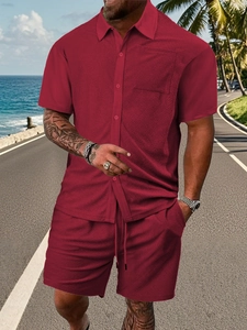 Detail of burgundy button-down shirt and shorts set with textured jacquard fabric for men
