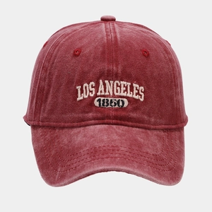 Close-up of vintage burgundy washed cotton baseball cap with Los Angeles embroidery