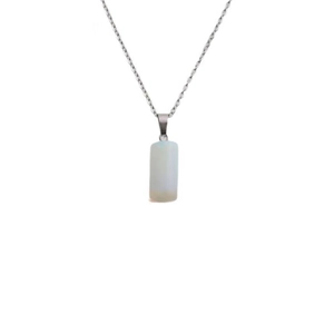 Minimalist silver chain necklace featuring a white rectangular cylinder stone pendant
