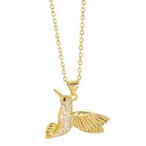 Minimalist gold hummingbird pendant necklace with sparkling rhinestones for women