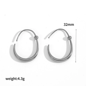 Detail view of 32mm silver stainless steel oval earrings with bead top showing size and weight