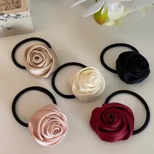 Set of five elegant satin rose hair ties in champagne, pink, white, black and red