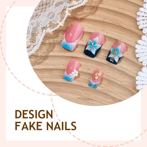 Blue ocean-themed fake nails with 3D floral designs, pearls and golden starfish charms