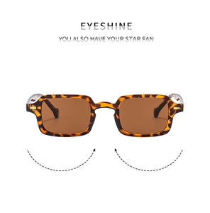 Close-up of tortoise shell pattern frame and dark brown lenses of retro square sunglasses