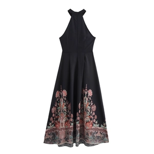 Vintage halter neck paisley print maxi dress in black with floral patterns on white background