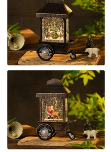 Detail of vintage bronze Christmas snow globe lamp with Santa and pine tree scenery