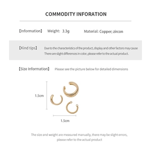 Detail view of three-piece copper zircon ear cuff set with 1.5cm x 1.5cm size chart