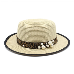 Summer straw boater hat for women with leopard print ribbon and pearl embellishments