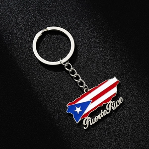 Polished silver keychain featuring Puerto Rico flag pendant with artistic metal lettering