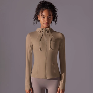 Detail of hooded sports jacket with thumbholes and functional zipper in khaki