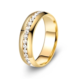 Detail of gold-plated stainless steel eternity ring with channel-set sparkling cubic zirconia