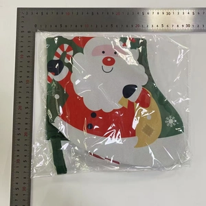 Detail of Christmas stocking bag featuring Santa Claus print and sturdy hanging loop