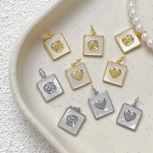 Square gold and silver plated mother of pearl pendants with rose and heart designs
