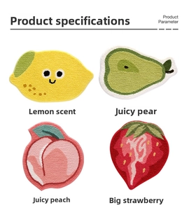 Detailed flocking texture of non-slip fruit-shaped bath mats in lemon and peach designs