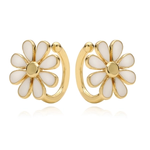 Detailed view of white enamel daisy earrings with elegant gold-tone metal finish