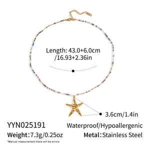 Detail view of gold starfish pendant with colorful beads and product specifications