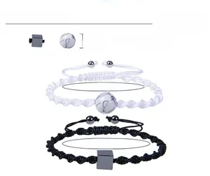Detail showing 12mm white howlite bead and square hematite on adjustable woven bracelets