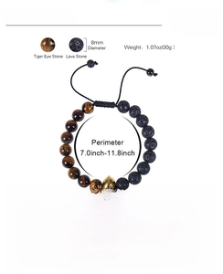 Detail of adjustable tiger eye and volcanic stone bracelet with a gold spartan helmet