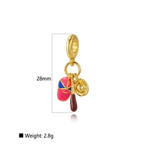 Detail view of gold baseball charms including bat, glove and hat with size and weight specs