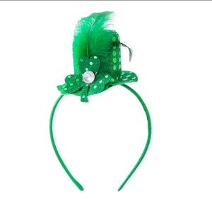 Detail of green sequin mini top hat headband with shamrocks and feathers for St. Patrick's Day