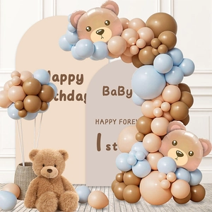 Teddy bear theme balloon arch with brown and blue latex balloons for 1st birthday decor