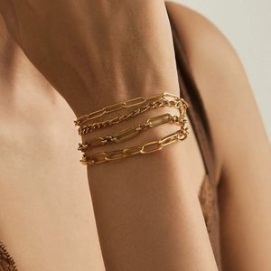 Stackable 18k gold plated 4-piece bracelet set for women with layered chain designs