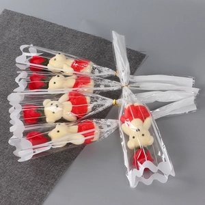 Five pieces of bear plush and red soap rose bouquets in individual clear gift packaging