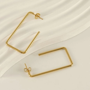 Minimalist 18K gold plated stainless steel geometric rectangle hoop earrings on white texture