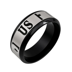 Close-up of men's titanium steel ring featuring black-silver dual tone and US cross engraving