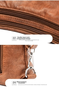 Detail of brown litchi leather bag showing double zipper pockets and silver metal hooks