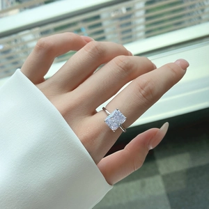 Close-up of a radiant cut square cubic zirconia on a minimalist S925 silver ring
