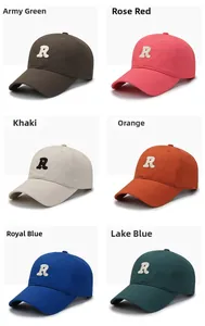 Detail view of the R-letter embroidery on six different colored canvas baseball caps