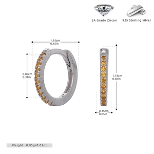 Detail showing 925 sterling silver hoop earrings with yellow 5A cubic zirconia stones