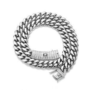Polished stainless steel Cuban link necklace with micro-pave zircon buckle and S logo