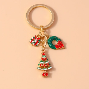 Christmas keychain with gold ring featuring gift box, wreath, and tree enamel charms