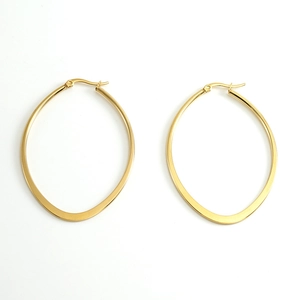 Detailed view of large oval 18K gold plated hoop earrings in polished titanium steel