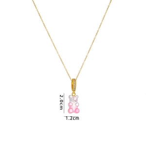 Close-up of pink gummy bear pendant with dimensions 2.0cm x 1.2cm and gold chain
